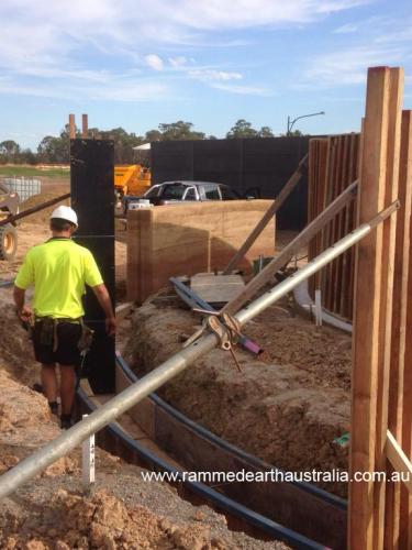 Curved multi coloured Rammed Earth in Sydney