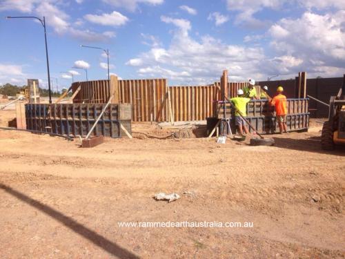 Curved multi coloured Rammed Earth in Sydney